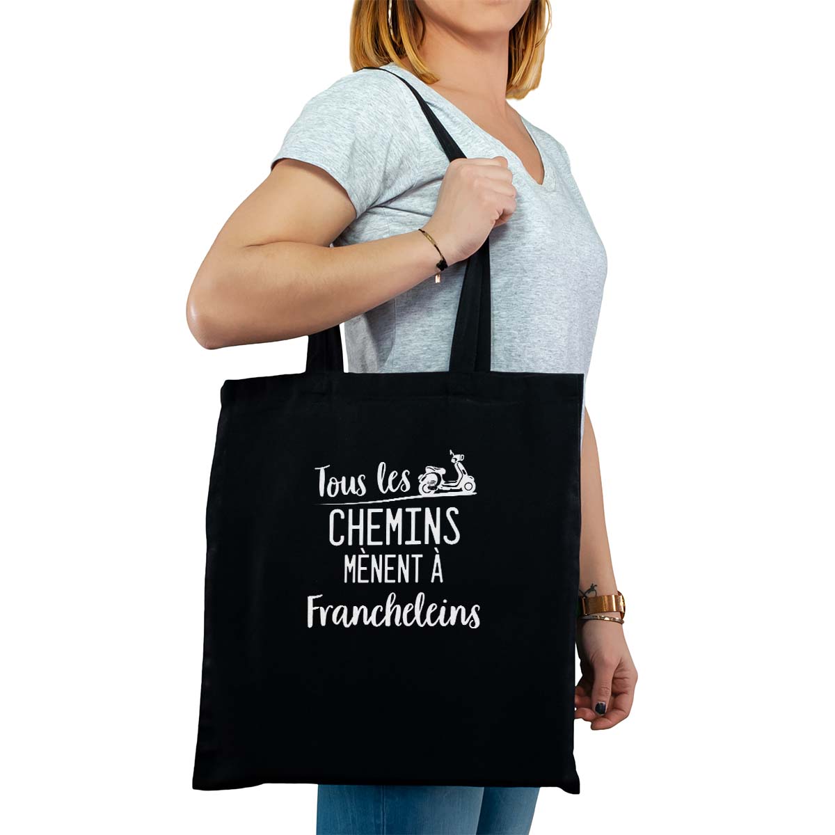 Totebag cabas personnalisé noir pour femme avec le message personnalisé blanc tous les chemins mènent à francheleins