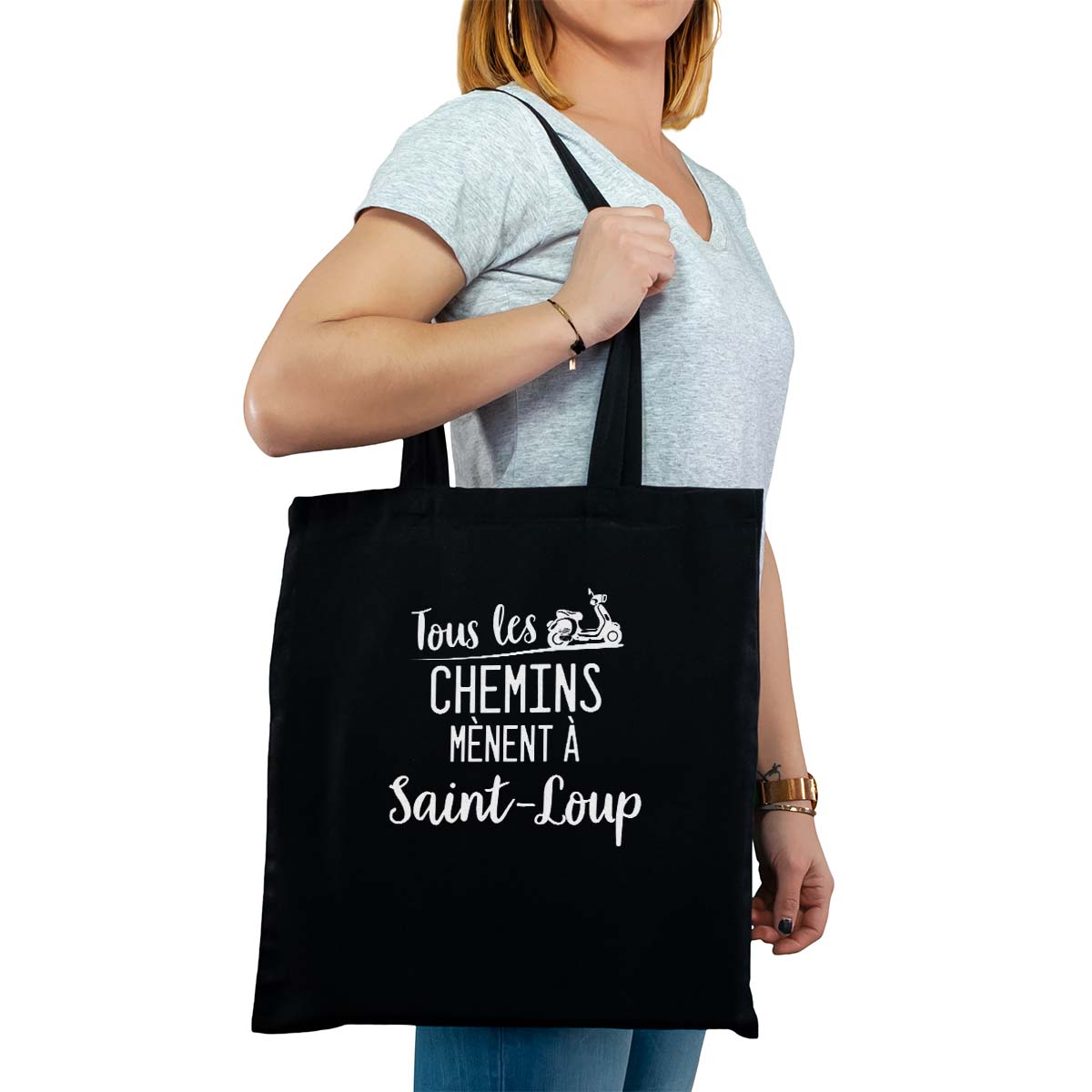 Totebag cabas personnalisé noir pour femme avec le message personnalisé blanc tous les chemins mènent à saint-loup