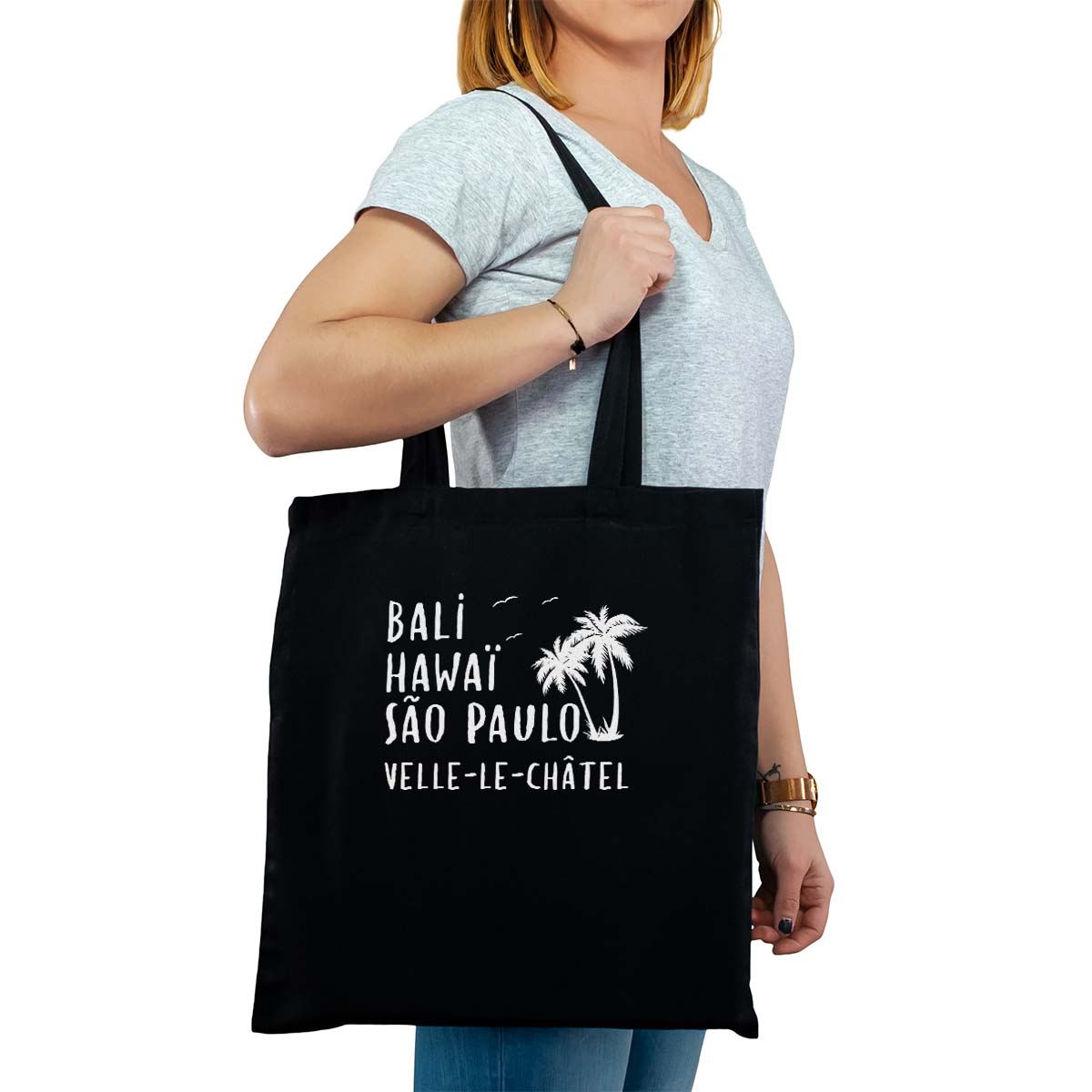 Totebag cabas personnalisé noir pour femme avec le message personnalisé blanc bali hawaï sao-paulo velle-le-châtel