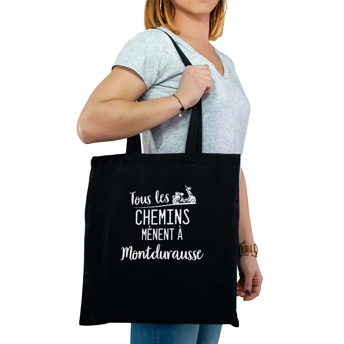 Totebag cabas personnalisé noir pour femme avec le message personnalisé blanc tous les chemins mènent à montdurausse